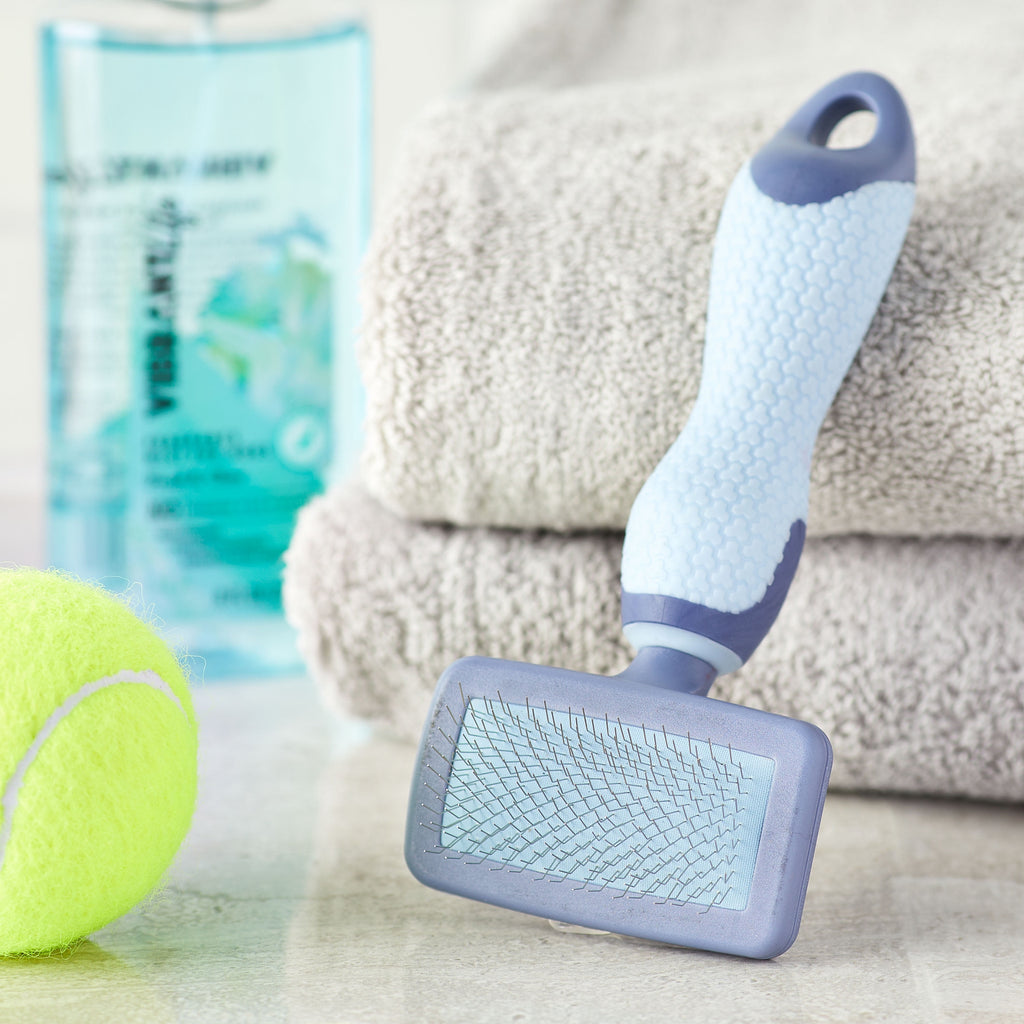 Plastic Dog Slicker Grooming Brush with a TPR Grip