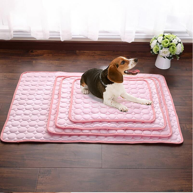 Dog laying on pink cooling mat various sizes