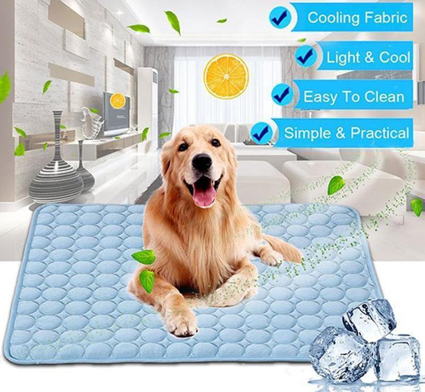 A dog laying on the light blue cooling mat with descriptive text that says "Cooling Fabric" "Light & Cool" "Easy to Clean" "Simple and Practical"