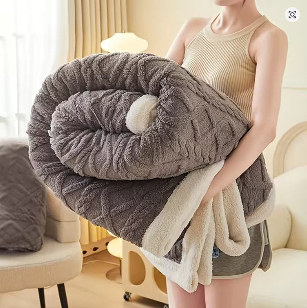 Weighted Blanket folded being held by adult female